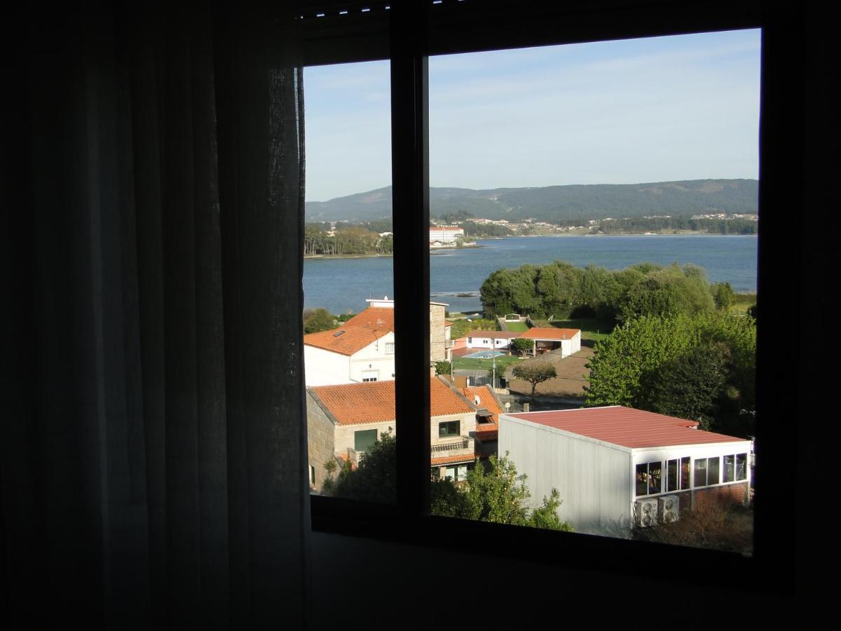 Apartamentos Blanco O Grove Luaran gambar